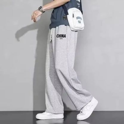 New Men's Casual Sports Pants Loose Elastic Waist Spring Autumn Versatile Straight Leg Long Trousers Comfortable Fit